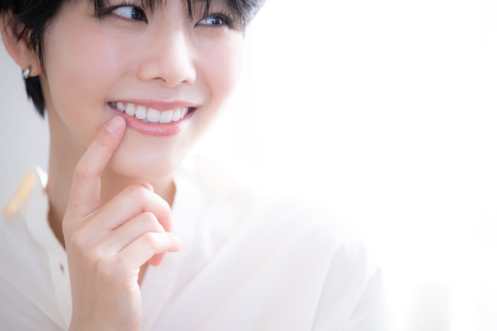 前歯を整えて笑顔に自信をもてるとうになった女性